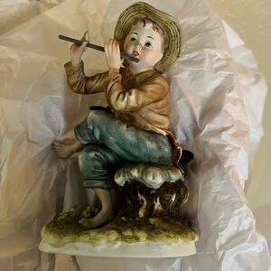 Tom Sawyer Figurine of a Boy Playing Flute Porcelain
